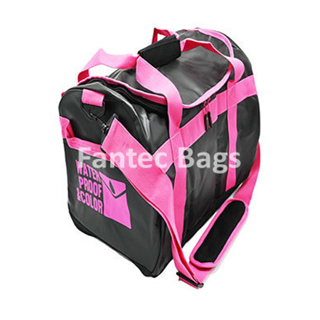 Pink and black PVC carryall bag with waterproof finish, padded shoulder strap, and multiple compartments