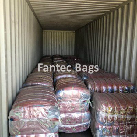 "Client requested packing method for cotton tote bags arranged in bulk shipment."