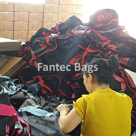 "Stacked waterproof PVC bags prepared for shipment and logistics."