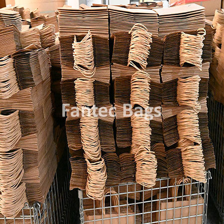 "Drying process for large kraft paper pulp bags arranged in bulk."