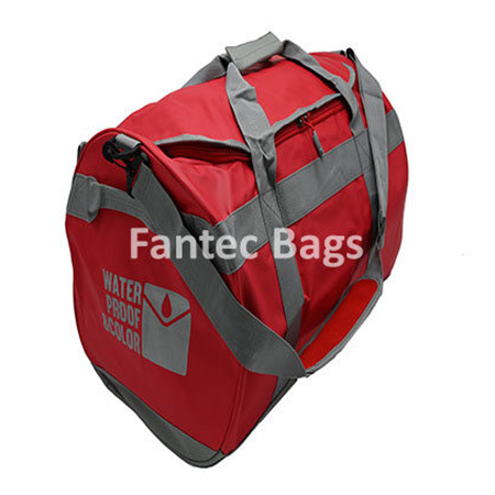 Red duffel bag with grey straps, nonsorbent waterproof material, and printed text “Water Proof Color”