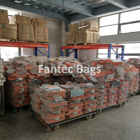 "Warehouse racks filled with kraft paper bags organized for packing and shipment."