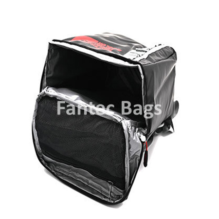 Interior view of black and grey insulated chiller ice bag with flap open, silver lining, and spacious leak proof compartment