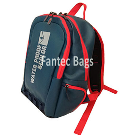 Nonporous PVC backpack in red and blue with padded straps, multiple compartments, and printed text “Water Proof & Fab.or.”