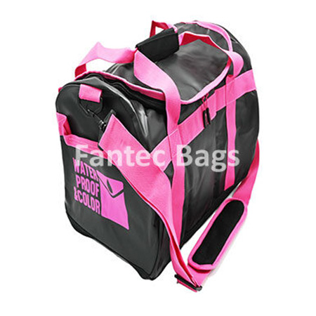 "Pink and black PVC duffle bag with glossy waterproof surface and reinforced seams."