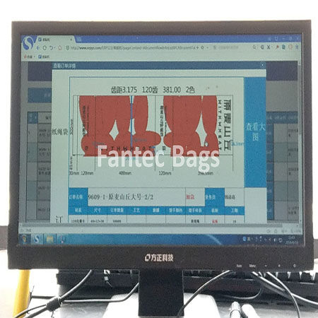 "Computer monitor displaying kraft paper bag design layout and specifications for industrial printing machine."