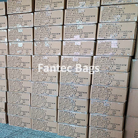 "Organized cartons stacked neatly, prepared for container shipment loading."