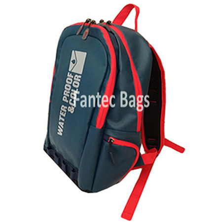 "Red PVC bag with waterproof surface and reinforced seams."