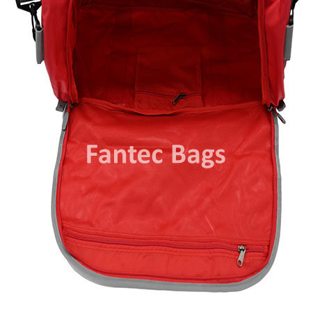 Zipper access camber view of red and grey equipment bag showing mesh pocket, zippered compartments, and organized interior