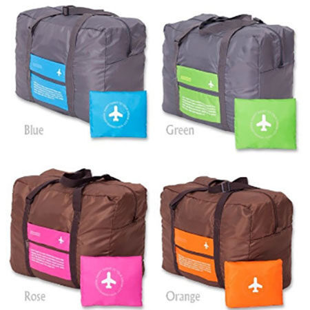 Grey nylon duffel with suitcase strap attachment