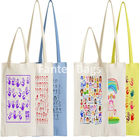 "Assorted canvas tote bags featuring colorful handprints, faces, and playful artwork."