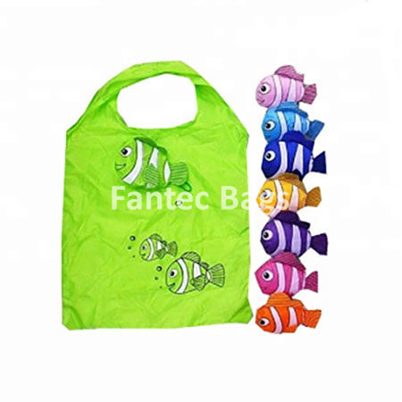 Green nylon shopping bag with cartoon fish print and fish shaped storage pouches